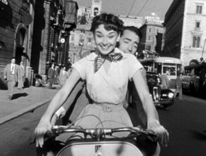 Audrey_Hepburn_and_Gregory_Peck_on_Vespa